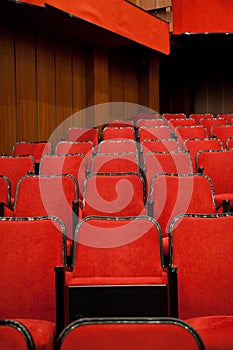 Modern cinema hall empty and red comfortable seats