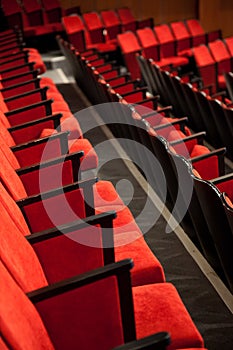 Modern cinema hall empty and red comfortable seats