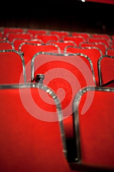 Modern cinema hall empty and red comfortable seats