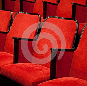 Modern cinema hall empty and red comfortable seats