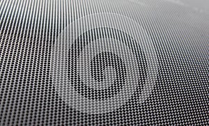 Modern circular pattern sheet metal panel, faded out to the corner