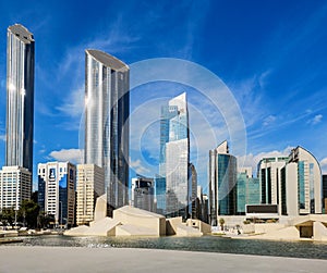 Modern city architecture and famous skyscrapers of Abu Dhabi skyline with beautiful clouds, World Trade Center, UAE