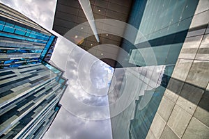 Modern city buildings in the business center, upward skyward view