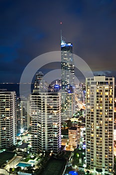 Modern city at night at vertical format