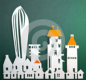 Modern City, office buildings, skyscrapers and town houses. Property and house buying concept. Paper cut design background.