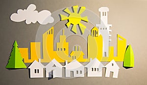 Modern City, skyscrapers and town houses. Property and house buying concept. Paper cut design background.
