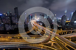 Modern city traffic road at night. Transport junction.