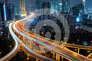 Modern city traffic road at night. Transport junction.