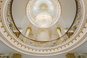 Modern classic interior view with Chandelier hanging from a ceil