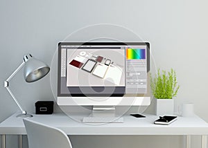 modern clean workspace with branding design software on screen
