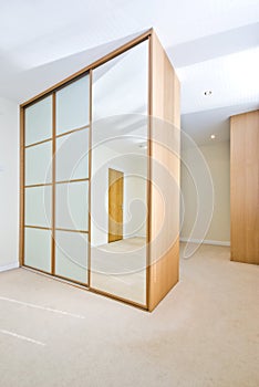 Modern cloakroom with large wardrobes photo