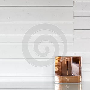 Modern clock on a sideboard