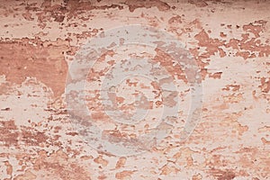 Modern closeup on soft pink backdrop. Old dirty wall texture. Grunge pink texture. Pastel paint texture background. Cracked paint