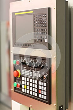 Modern CNC machine control panel close up