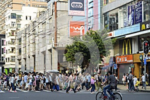 Modern commercial city street, urban shopping street with crowded people, street view of China