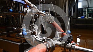 Modern complex technological industrial equipment. A plurality of pipelines, pumps, filters, gauges, sensors, motors and