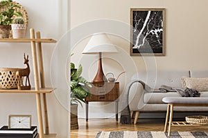 Modern composition of living room interior with brown mock up poster frame, design retro commode and grey sofa.