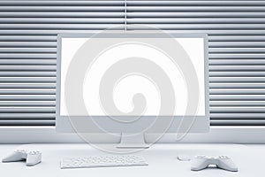 Modern computer monitor with light blank screen with place for web design or website on white work table with joystick and