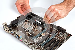 Modern computer mother board assembly, memory installation.