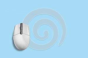 Modern computer mouse on color background