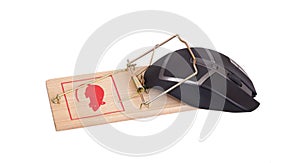 Modern computer mouse in a mousetrap