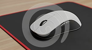 Modern computer mouse with a white smooth surface and ergonomic