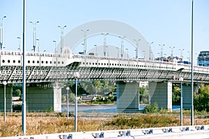 Modern concrete bridge over the river industrial landscape photo