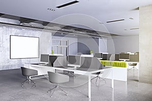 Modern concrete coworking office interior with blank white mock up banner, furniture, computer monitors and daylight. Workplace,