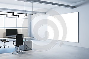 Modern concrete coworking office interior with blank white mock up banner on wall, panoramic windows and daylight, furniture and