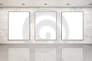 Modern concrete interior with three blank white banners on wall with reflections