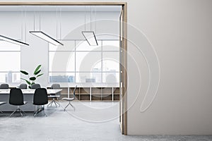 Modern concrete meeting room office interior with blank mock up place on wall, window and city view, furniture and other items. 3D