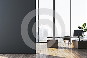 Modern concrete office interior with empty mock up place on wall, wooden parquet flooring, panoramic windows and city view.