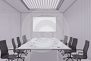 Modern concrete office meeting room interior with blank white mock up banner on wall, furniture, daylight, and equipment.