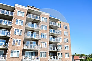 Modern condo buildings with huge windows and balconies in Montreal