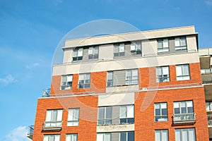 Modern condo buildings with huge windows and balconies in Montreal