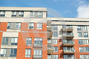 Modern condo buildings with huge windows and balconies in Montreal