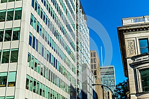 Modern condo and business buildings with huge windows in Montreal downtown