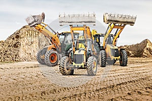 Modern construction machinery at a construction site in a quarry. Powerful modern equipment for earthworks. Rental of construction