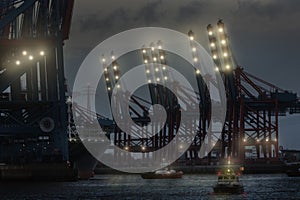 Modern container terminal in evening lights composing
