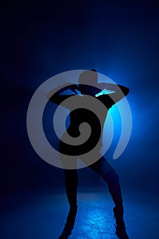 Modern, contemp. young woman, flexible female dancer dancing alone, isolated in studio