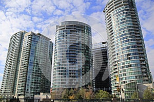 Modern, Contemporary Glass Luxury Condo High Rise Buildings. New Construction