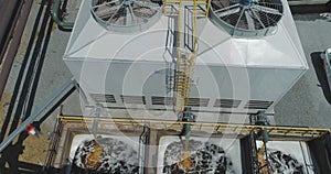 Modern cooling tower close-up. Modern industrial water cooling system. Industrial exterior