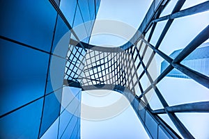 Modern corporate office building and blue sky with clouds