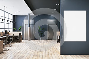 Modern coworking office interior with empty white mock up banner, wooden flooring, panoramic windows with city view, dark concrete