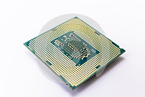 Modern CPU processor chip isolated on white background.
