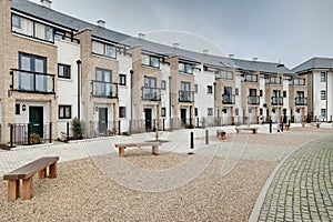 Modern crescent of townhouses and apartments