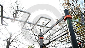 Modern crossbar for sports and athletics and workout in village outdoors