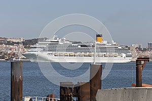 Modern cruise ship in front of lisbon portugal