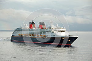 Modern cruise ship in port photo