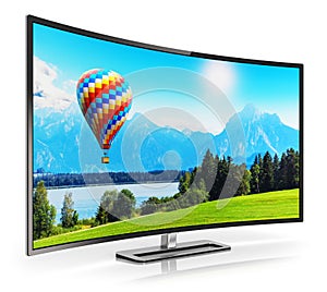 Modern curved 4K UltraHD TV photo